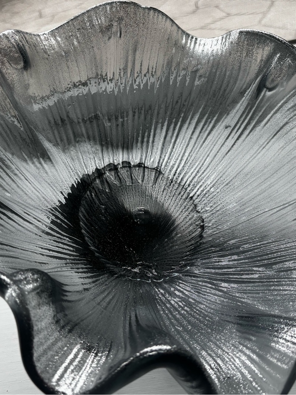 Murano-style Italian art glass piece featuring a gray color, silver bowl
